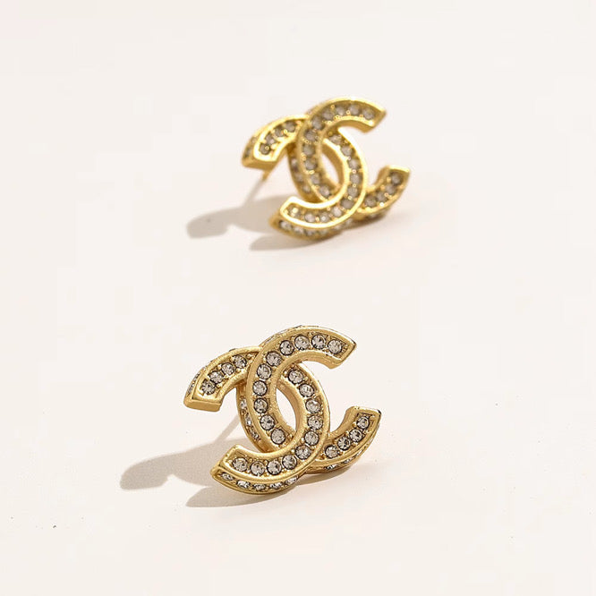 Gold Chanel Studs The Pynk Plug