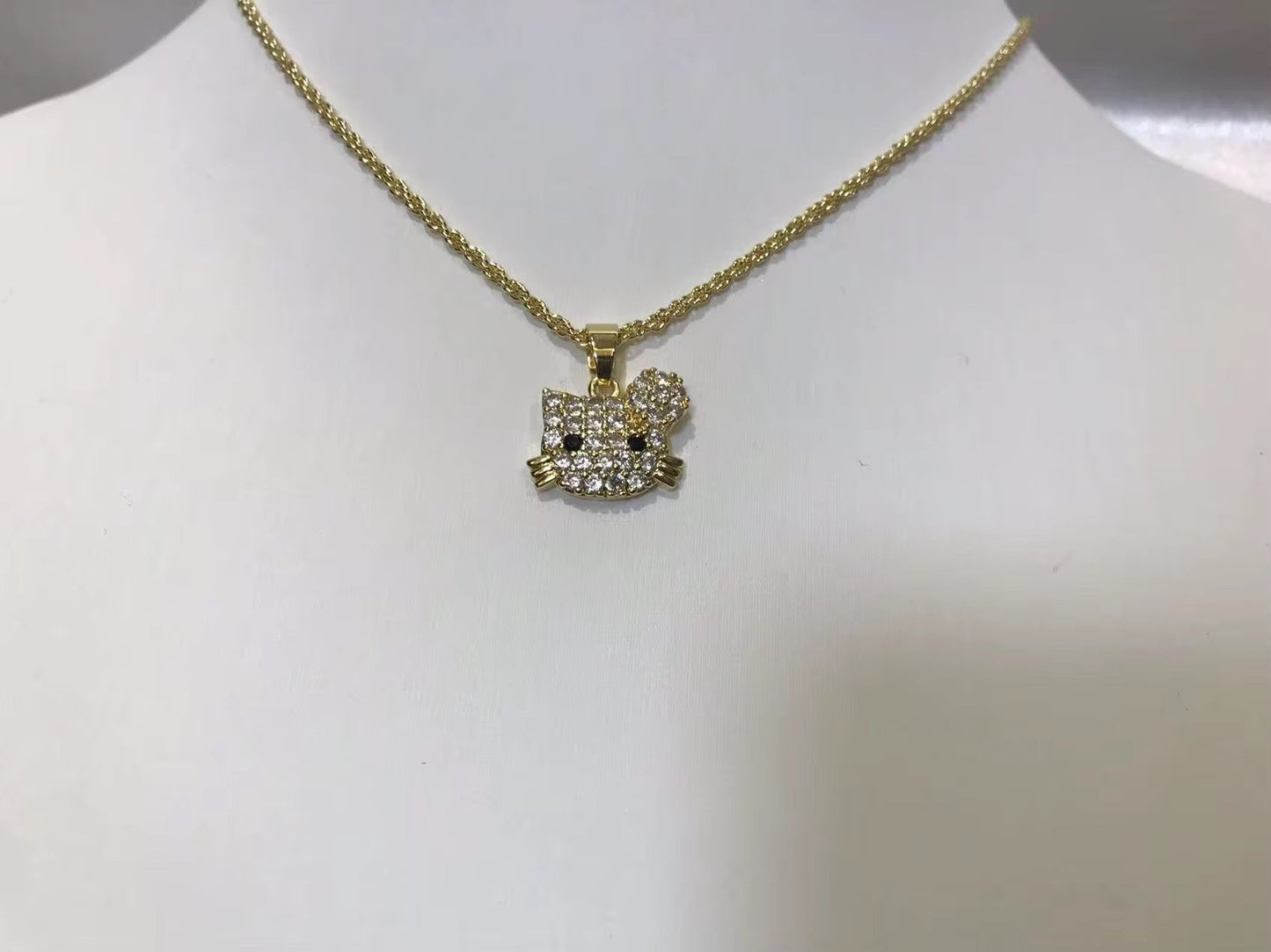 Iced Hello Kitty Face The Pynk Plug