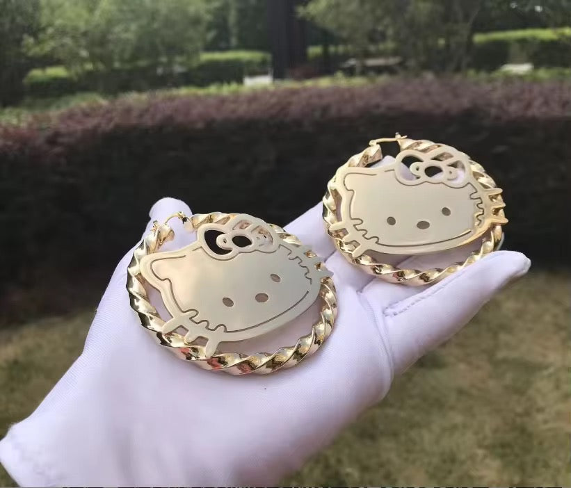 HK Gold Twist Hoops The Pynk Plug